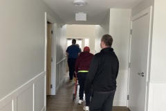 Participants touring hallway